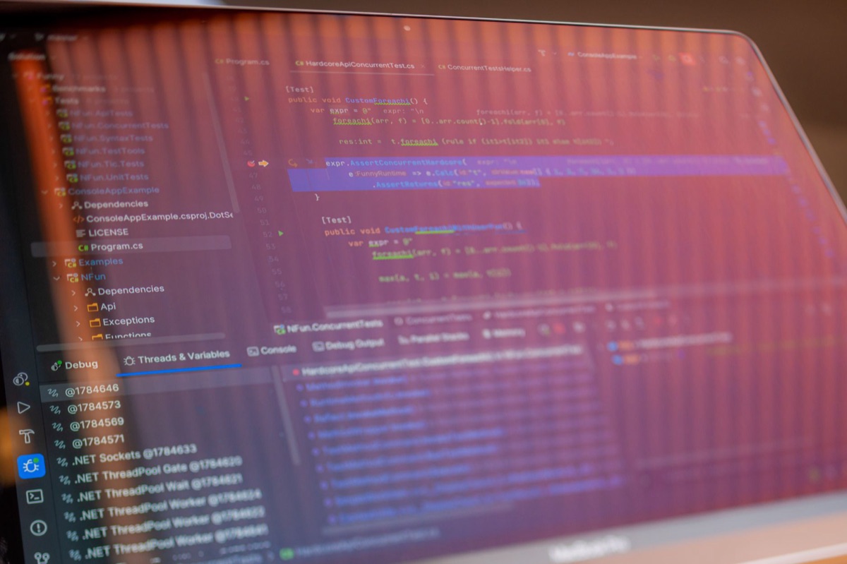 Close-up of complex code on a monitor representing agentic workflows